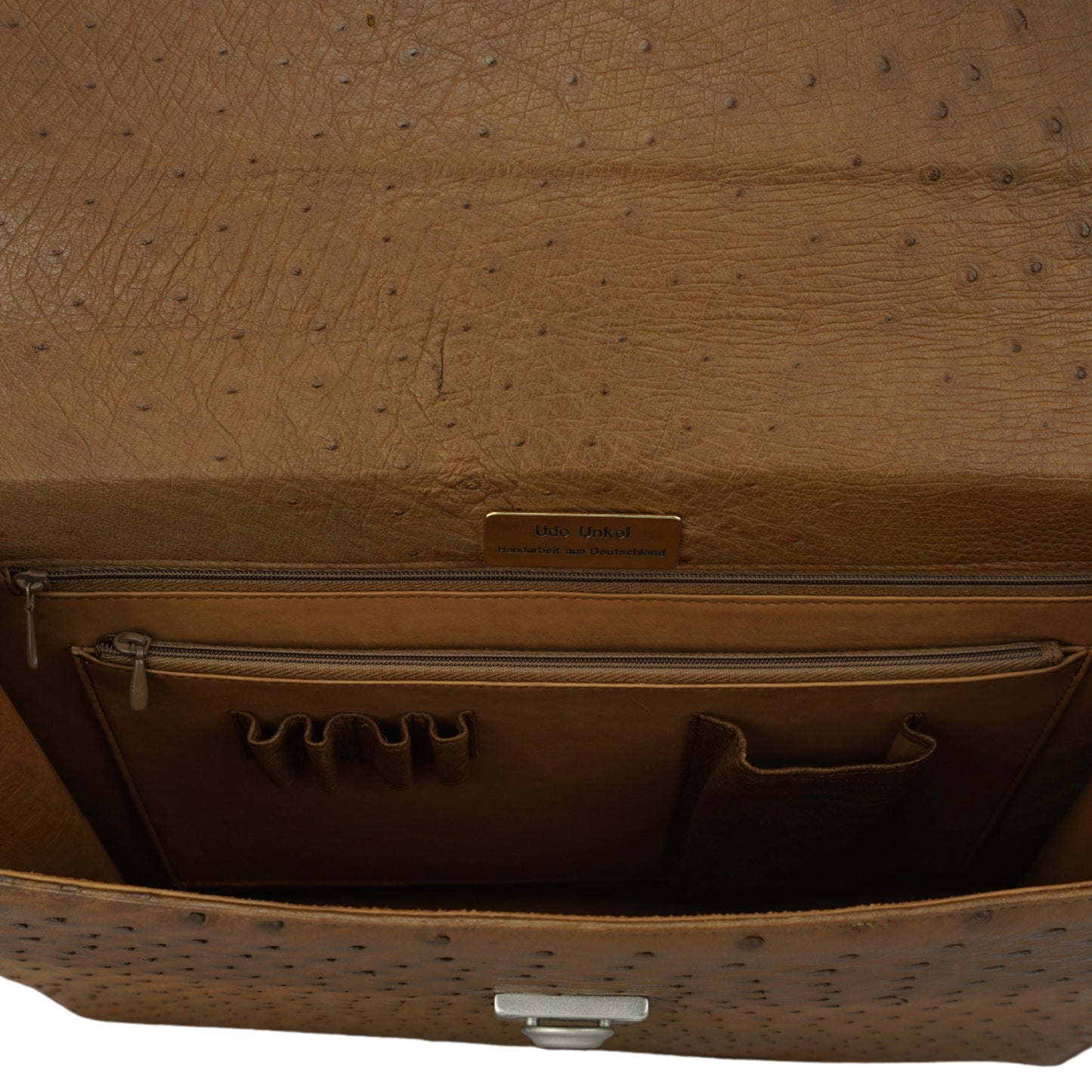 Briefcase in brown with silver-colored, lockable closure